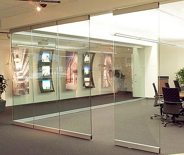 Egood frameless glass movable partition wall for modern office conference room, featuring top-hung ceiling track system and transparent glass panels. Egood frameless glass movable partition wall for modern office conference room, featuring top-hung ceiling track system and transparent glass panels.