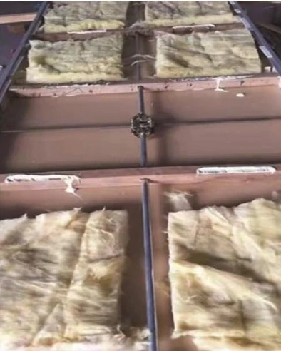 The same frame filled with high-density rock wool (sound insulation cotton), demonstrating the solid packing used for acoustic performance and fire resistance. The same frame filled with high-density rock wool (sound insulation cotton), demonstrating the solid packing used for acoustic performance and fire resistance.